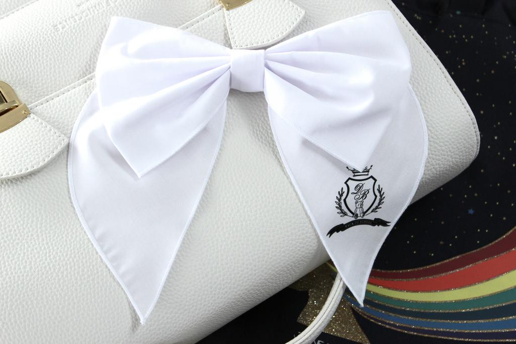 Бант на заколке  «OKSFORD». цвет: белый/черный герб