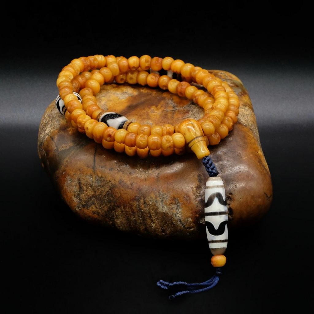 Четки из кости яка с бусинами дзи