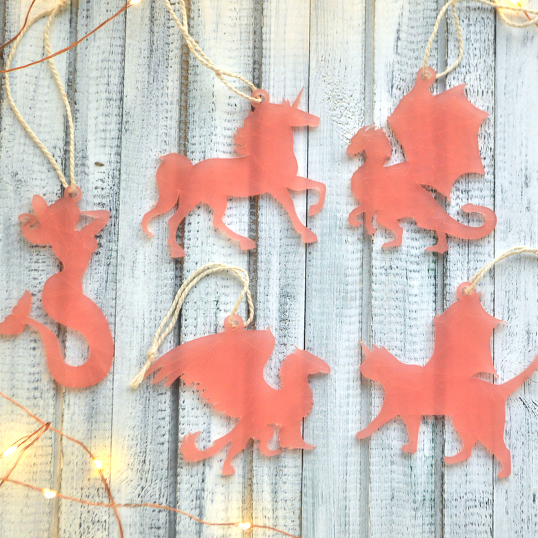 Набор розовых ёлочных игрушек Мифические существа в подарочной коробке - необычный подарок на Новый год