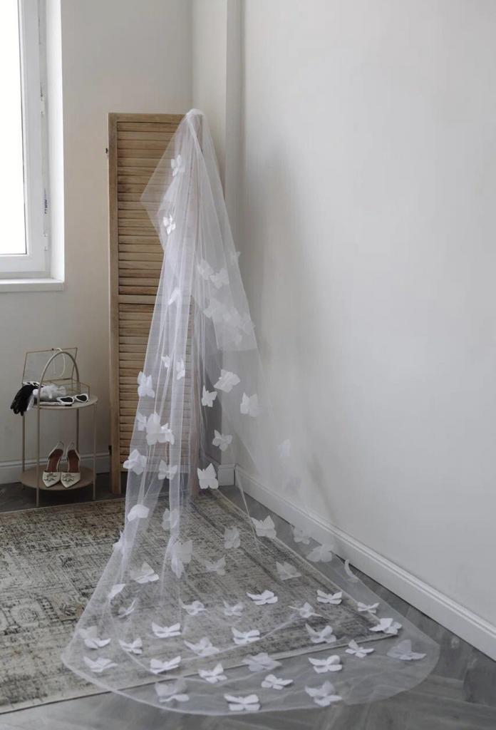 Veil very long with butterfly