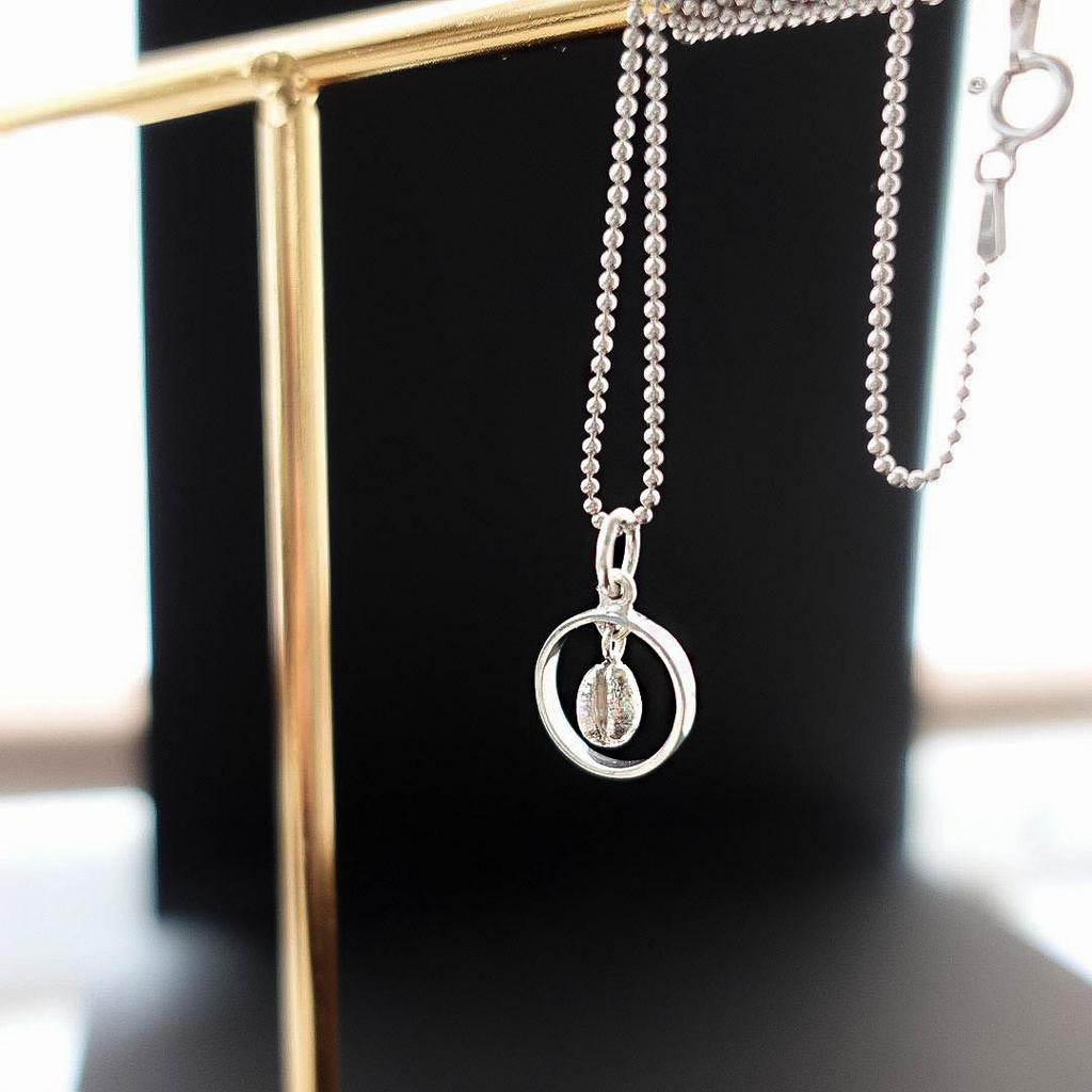 Кулон "Зерно в кольце"