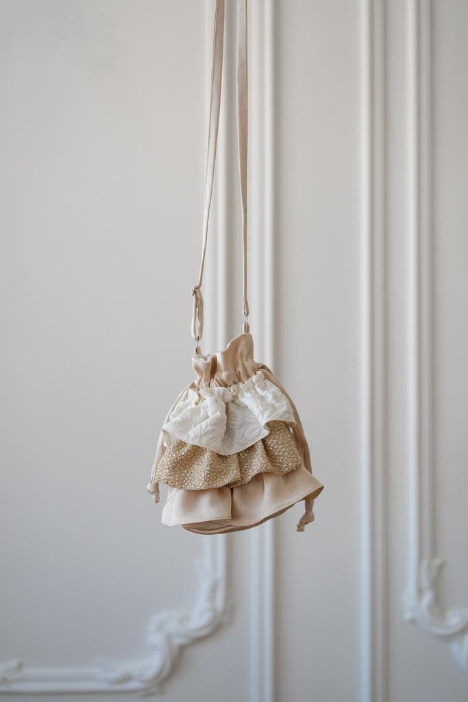 Шёлковая сумочка с рюшами