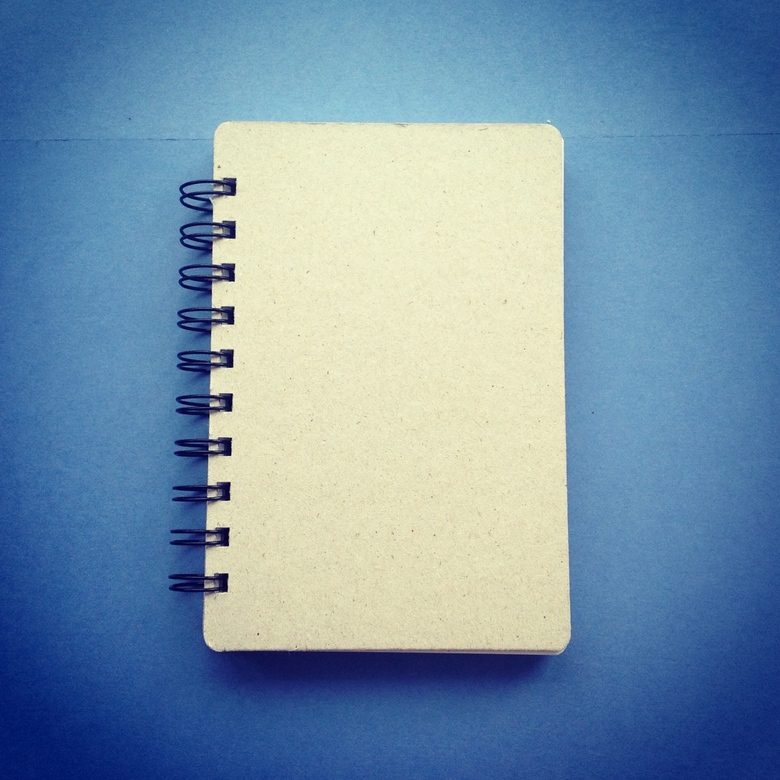 Блокнот с черными кольцами