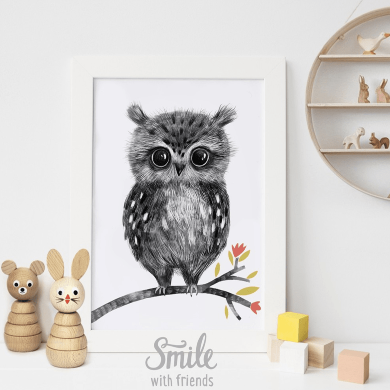 Малыш совенок на веточке