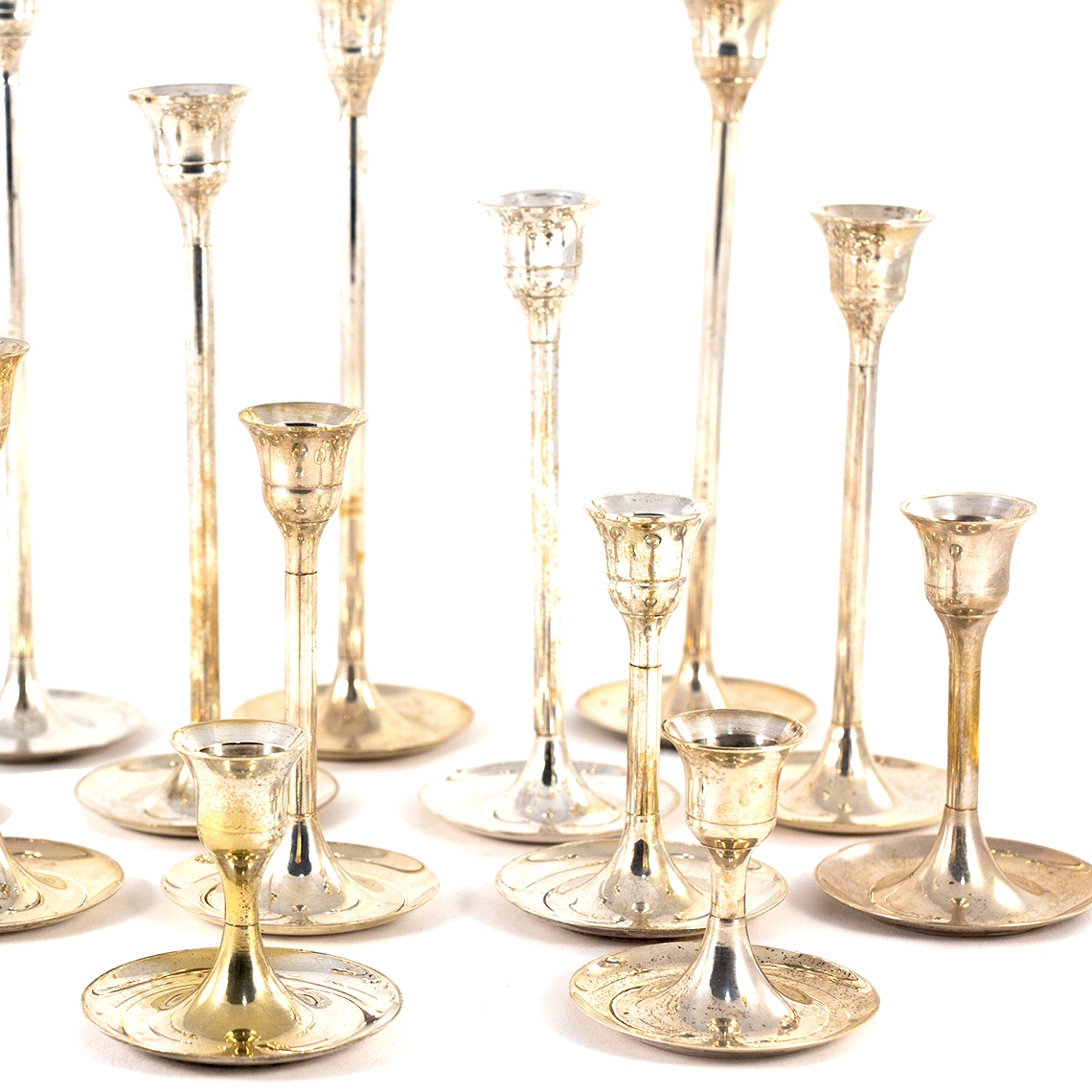 Набор из 12  серебряных подсвечников
