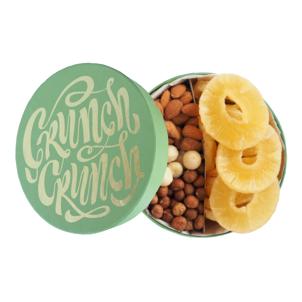 Большая зеленая коробка орехов и ананасов