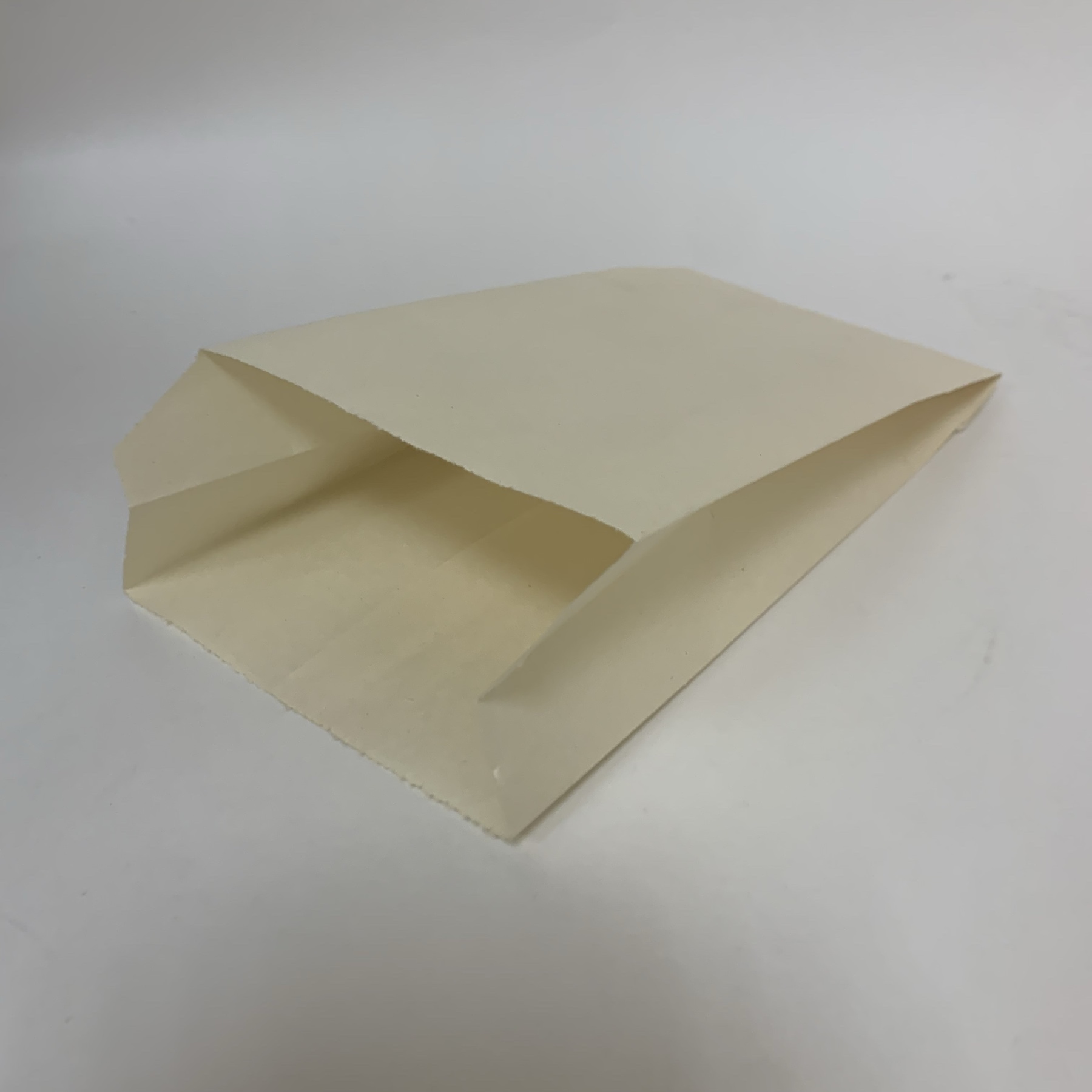 Пакет бумажный 140*60*200 мм, кремовый, РФ, 50 штук/упак.