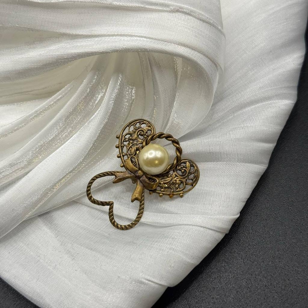 Винтажная брошь "Символ присутствия", США, 70е