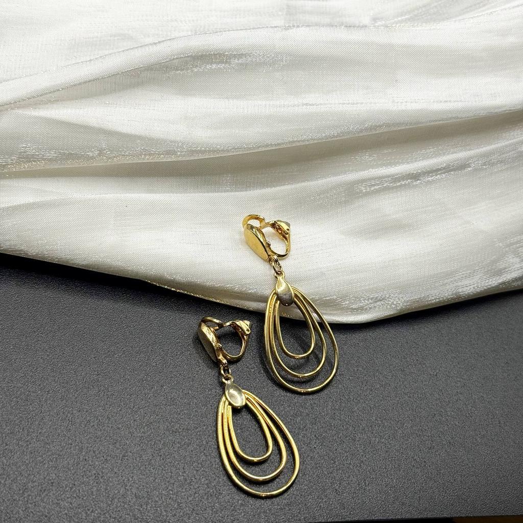 Винтажные клипсы "Пашмовая метаморфоза", США, 70е