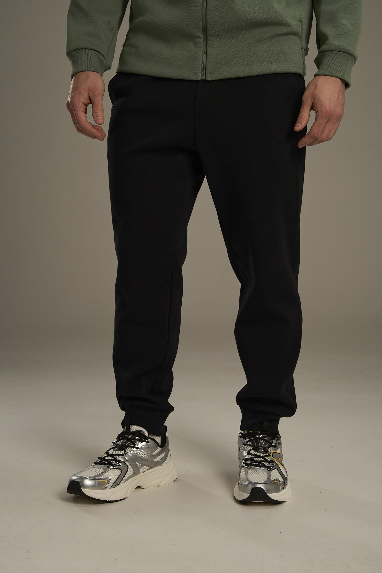 БРЮКИ ТРИКОТАЖНЫЕ УТЕПЛЕННЫЕ ANTA TRN KNIT TRACK PANTS