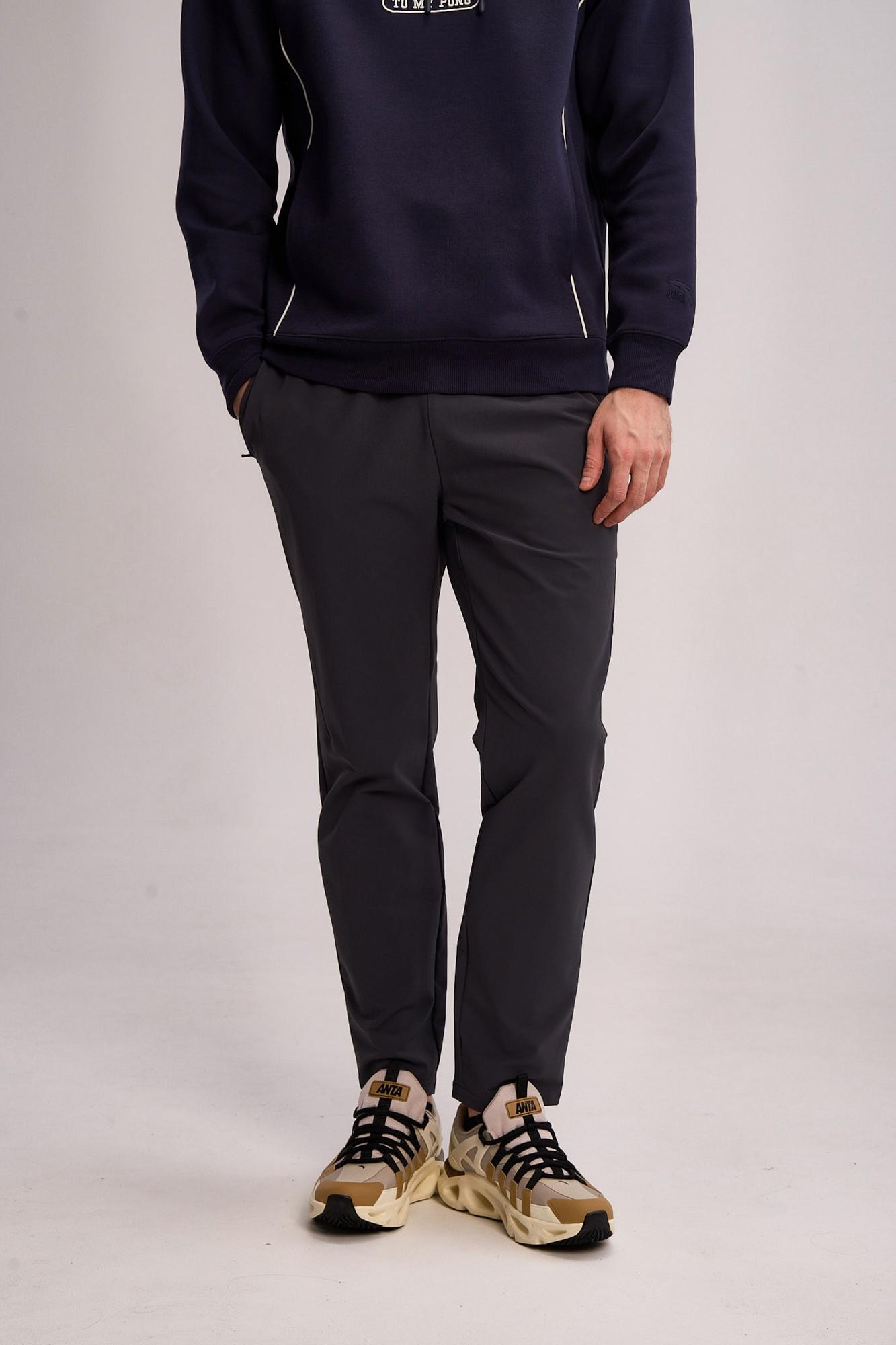 БРЮКИ ТЕКСТИЛЬНЫЕ ANTA TRN WOVEN TRACK PANTS