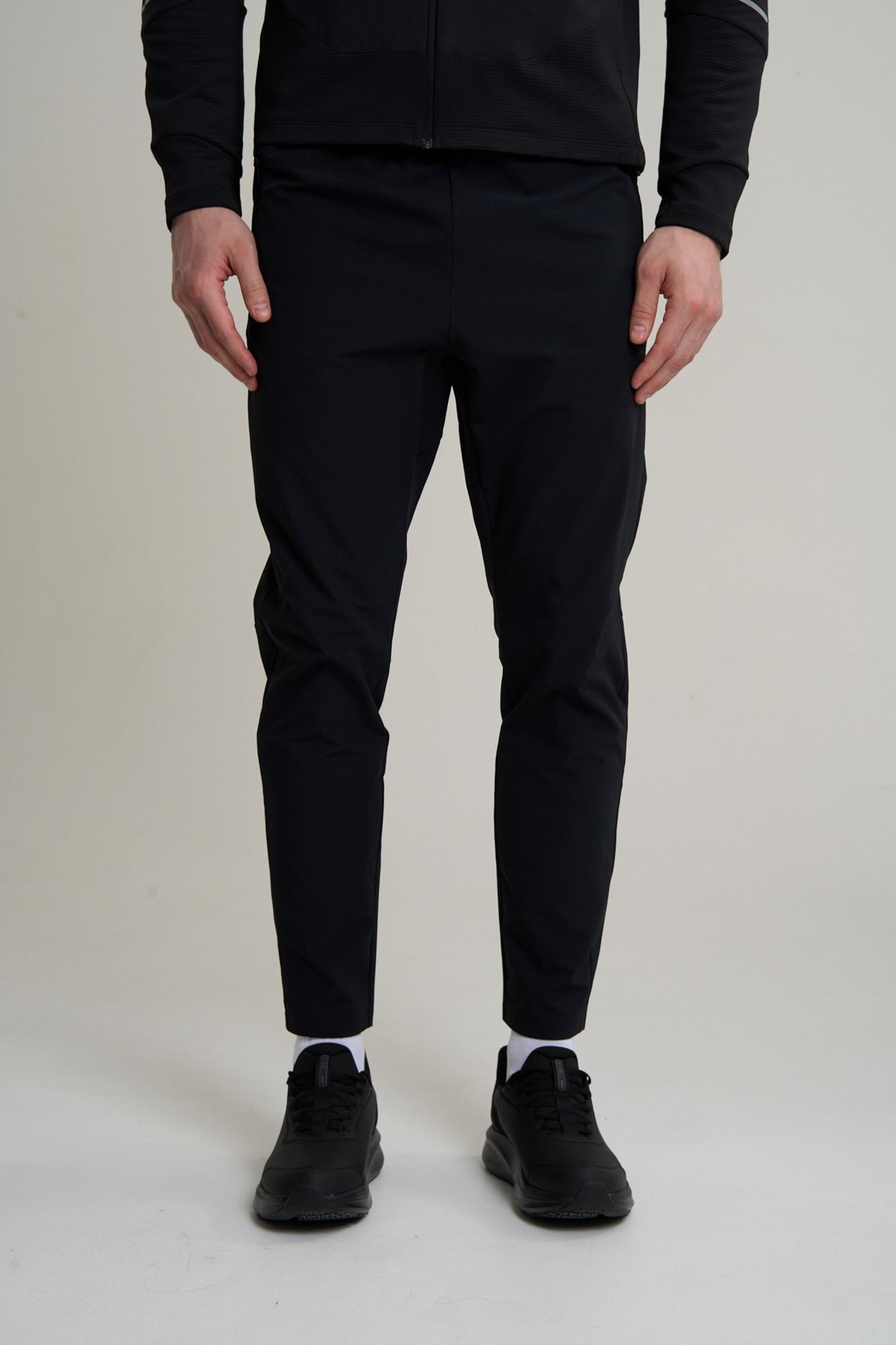 БРЮКИ ТЕКСТИЛЬНЫЕ ANTA RUNNING WOVEN TRACK PANTS