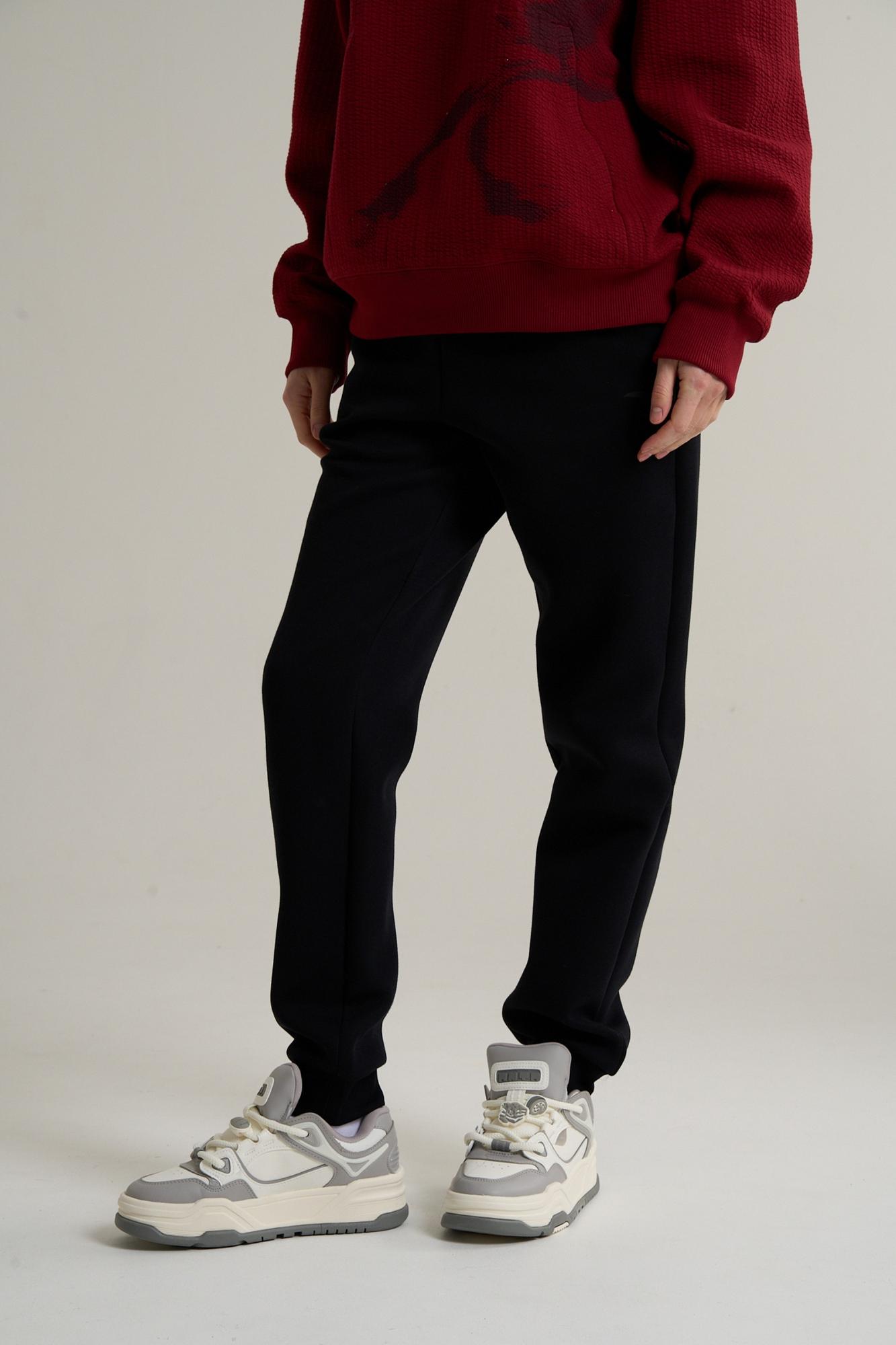 БРЮКИ ТРИКОТАЖНЫЕ УДЛИНЕННЫЕ ANTA TRN ESSENTIAL KNIT TRACK PANTS