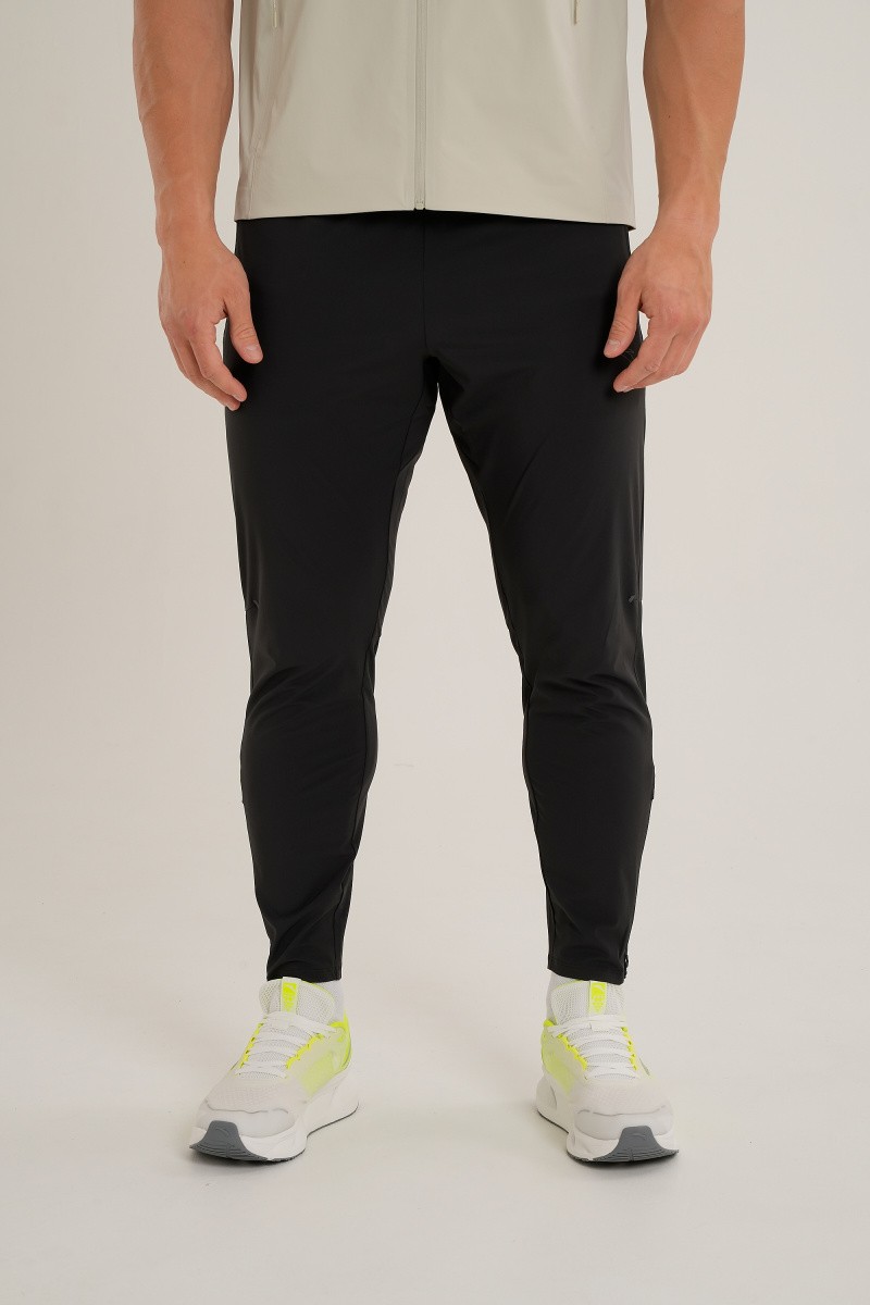 БРЮКИ ТЕКСТИЛЬНЫЕ ANTA RUNNING WOVEN ANKLE PANTS