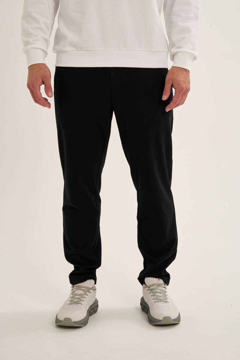 БРЮКИ ТРИКОТАЖНЫЕ ANTA TRN-ESSENTIAL KNIT TRACK PANTS