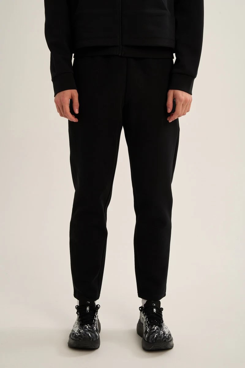 БРЮКИ ТРИКОТАЖНЫЕ УДЛИНЕННЫЕ ANTA TRN-ESSENTIAL KNIT TRACK PANTS