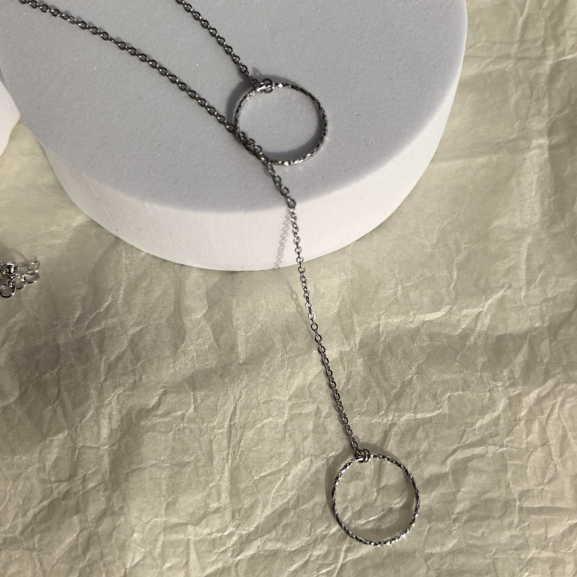 Колье галстук Кольца