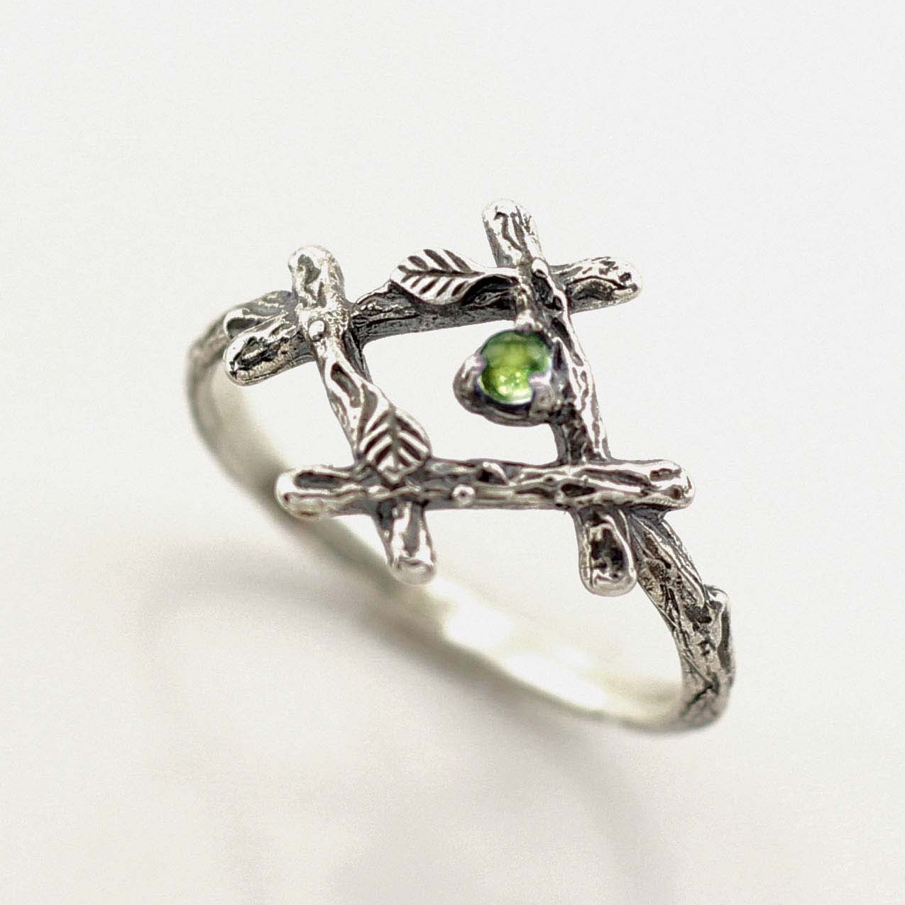 Cross ring with green tourmaline