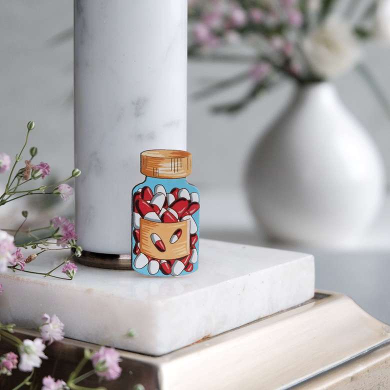 значок таблетки