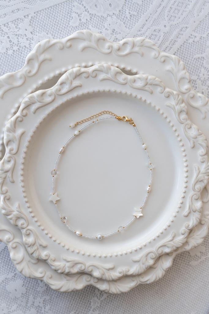 Ожерелье из бисера с перламутровой звездочкой