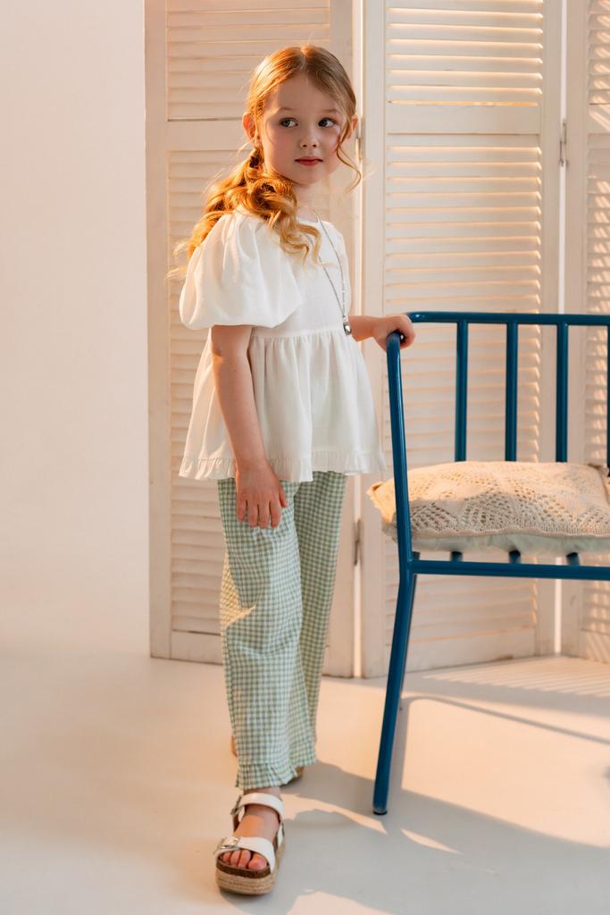 Брюки в зелёную клетку