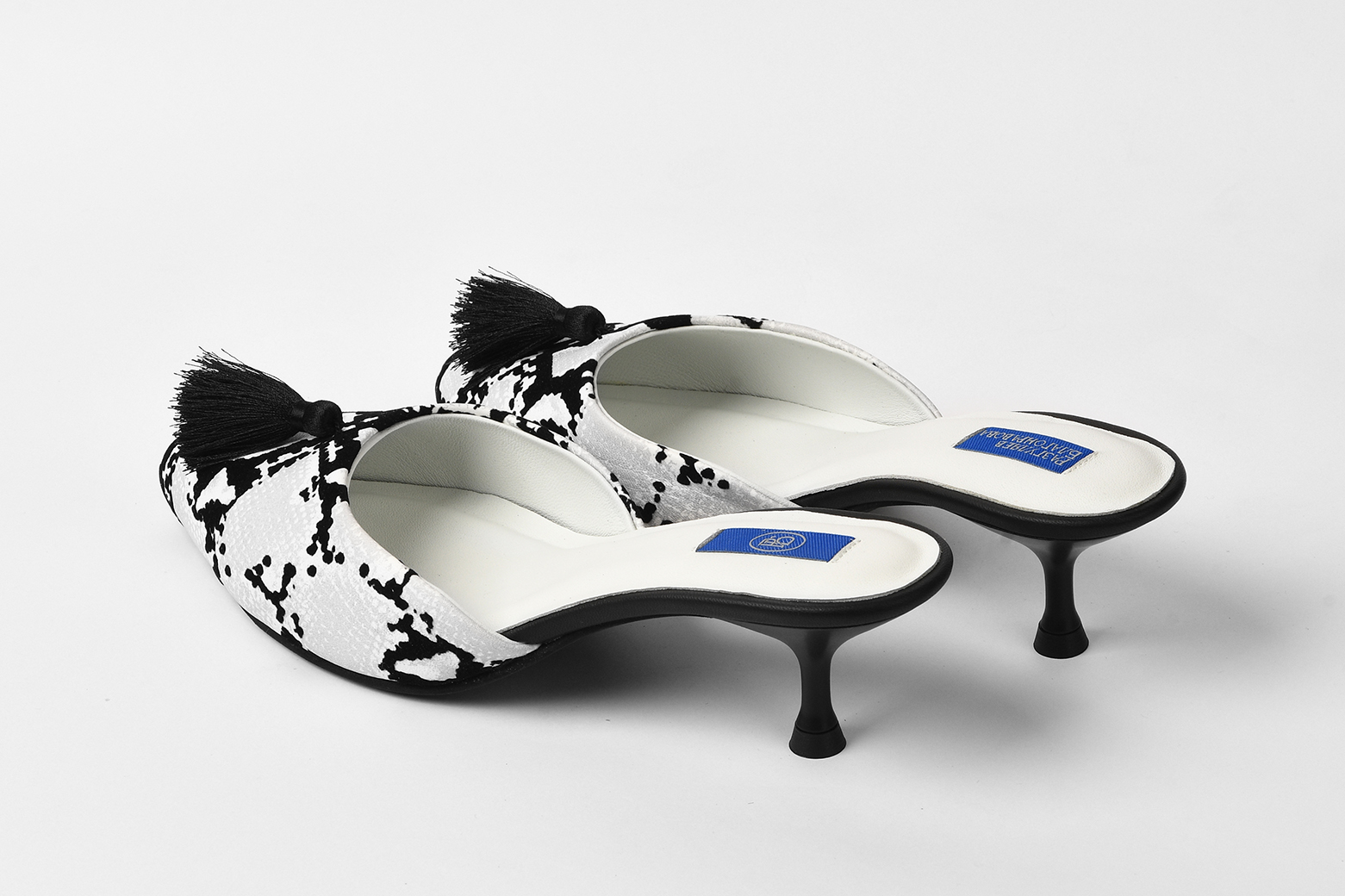 Мюли из натуральной кожи "Python Chic" с кисточкой