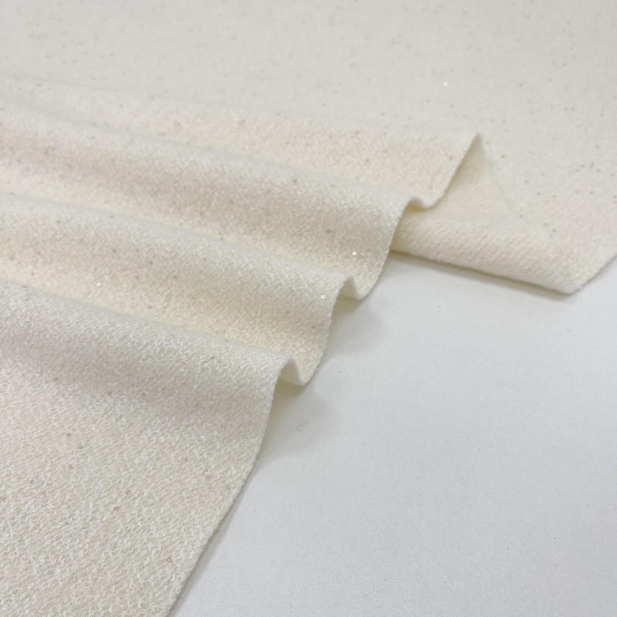 Буклированный шерстяной трикотаж с пайетками. Блестящий белый