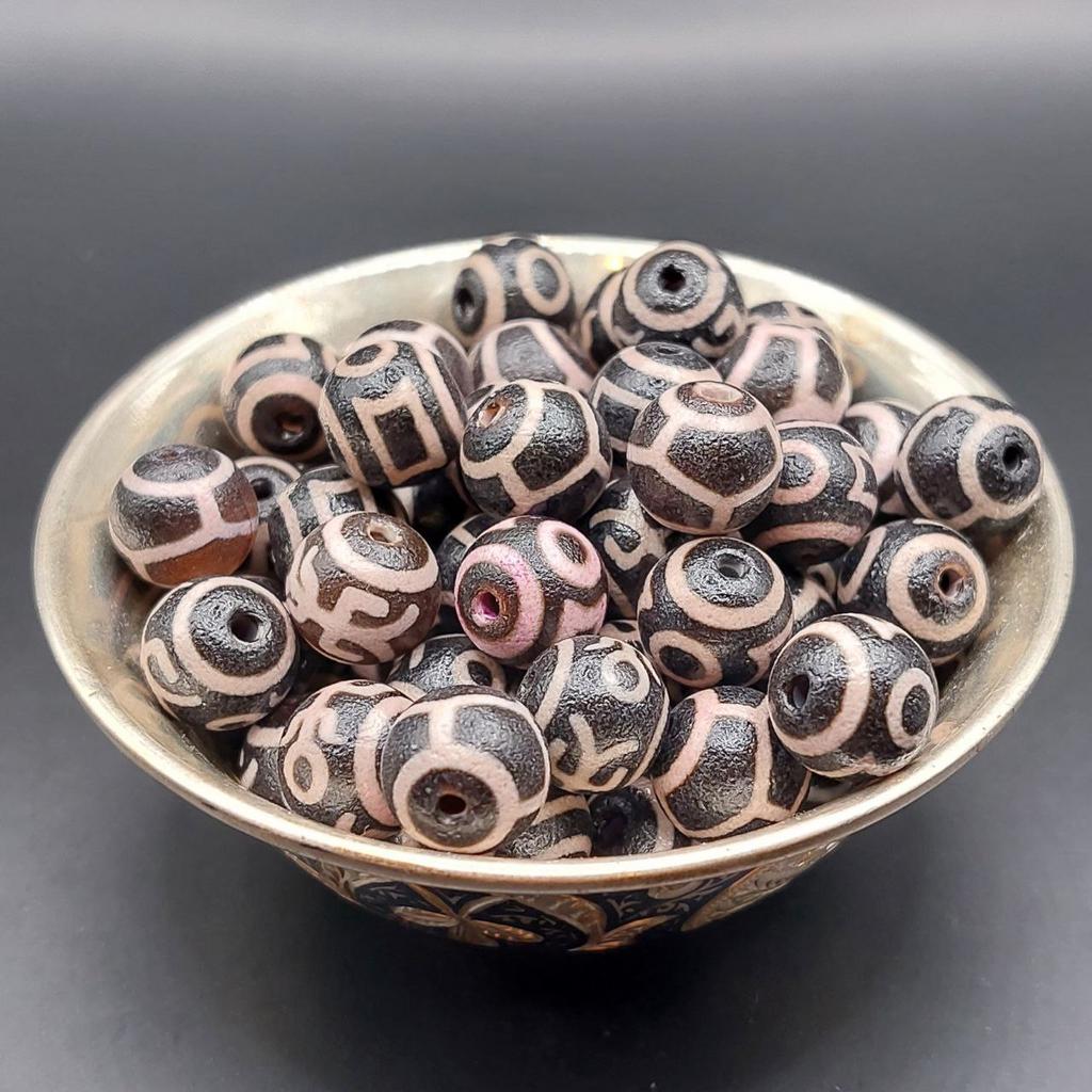 Бусина дзи из агата