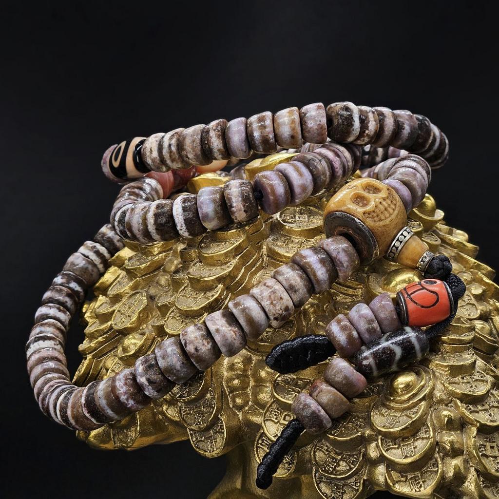 Четки из сломанных бусин дзи