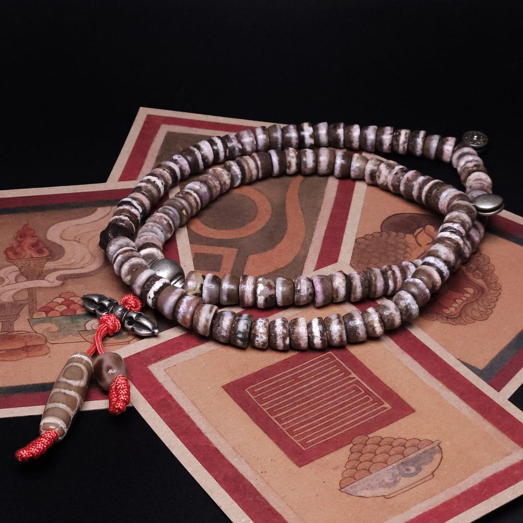 Четки из сломанных бусин дзи