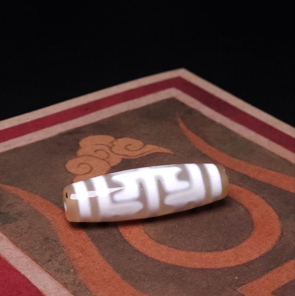 Бусина дзи шапка Падмасамбхавы N°2