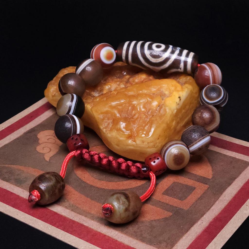 Браслет с бусиной дзи 3 глаза и глазковым агатом