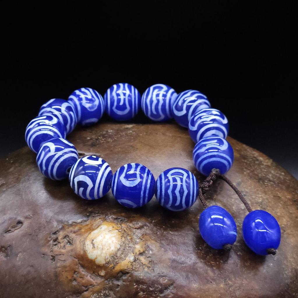 Браслет из крупных синих бусин дзи Гаруда