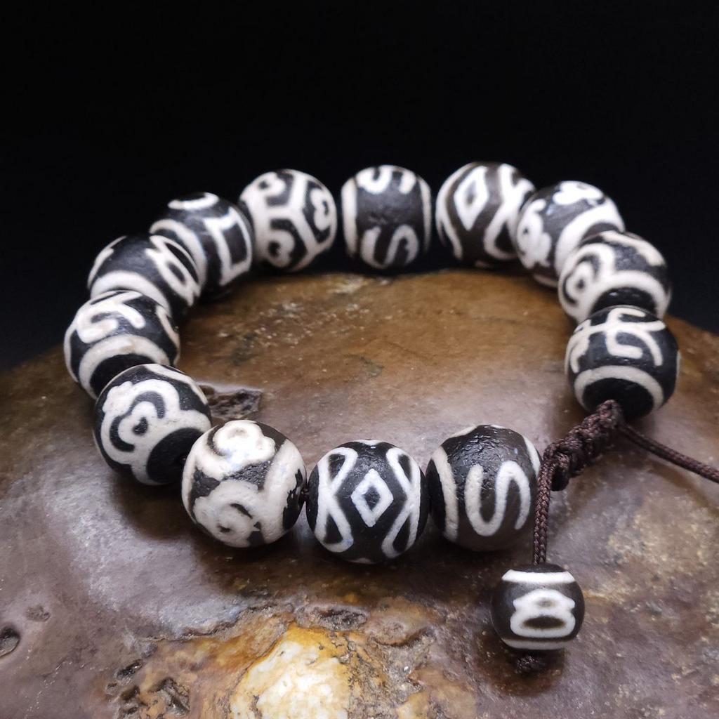 Браслет из чёрных бусин дзи 14 мм