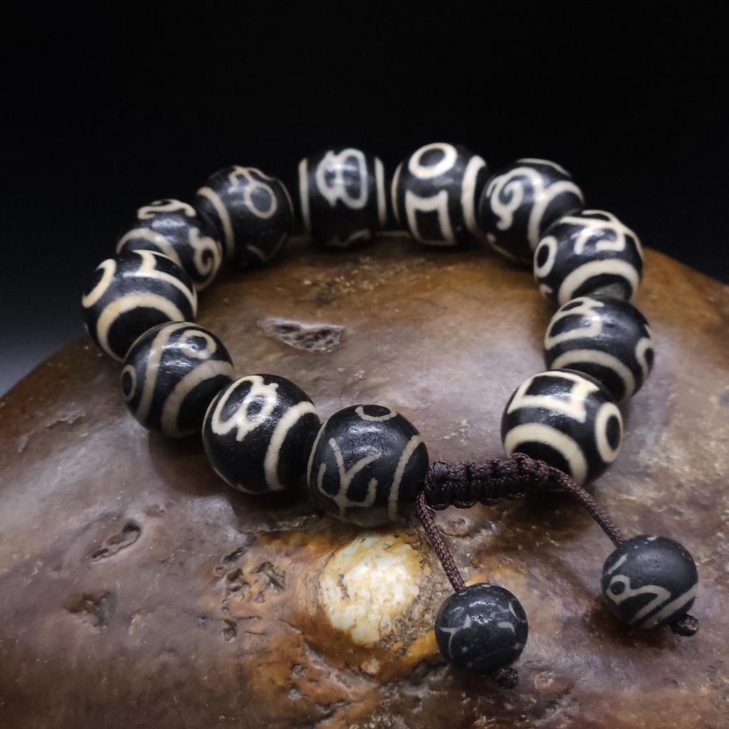 Браслет из чёрных бусин дзи 16 мм