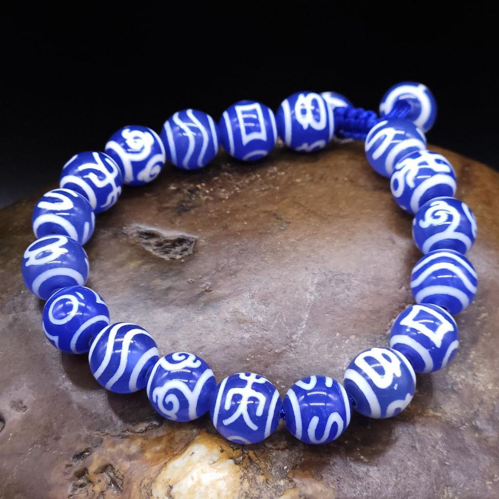 Браслет из синих бусин дзи 10 мм