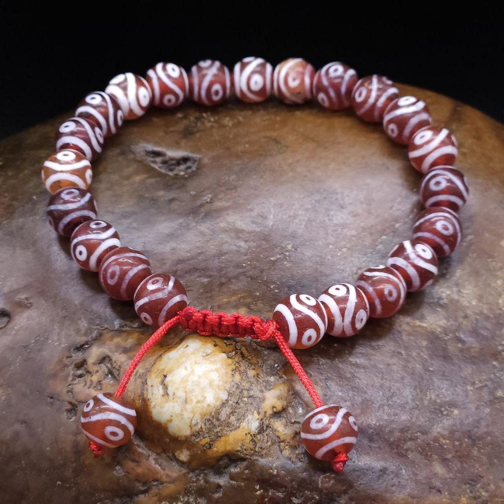 Браслет из красных бусин Дзи 4 глаза