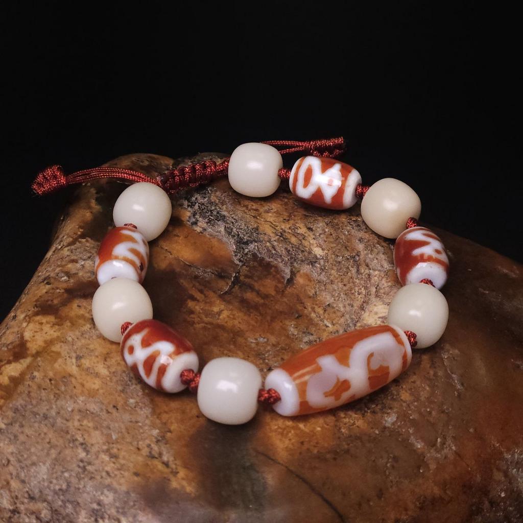 Браслет из бусин Дзи Кубера и бодхи
