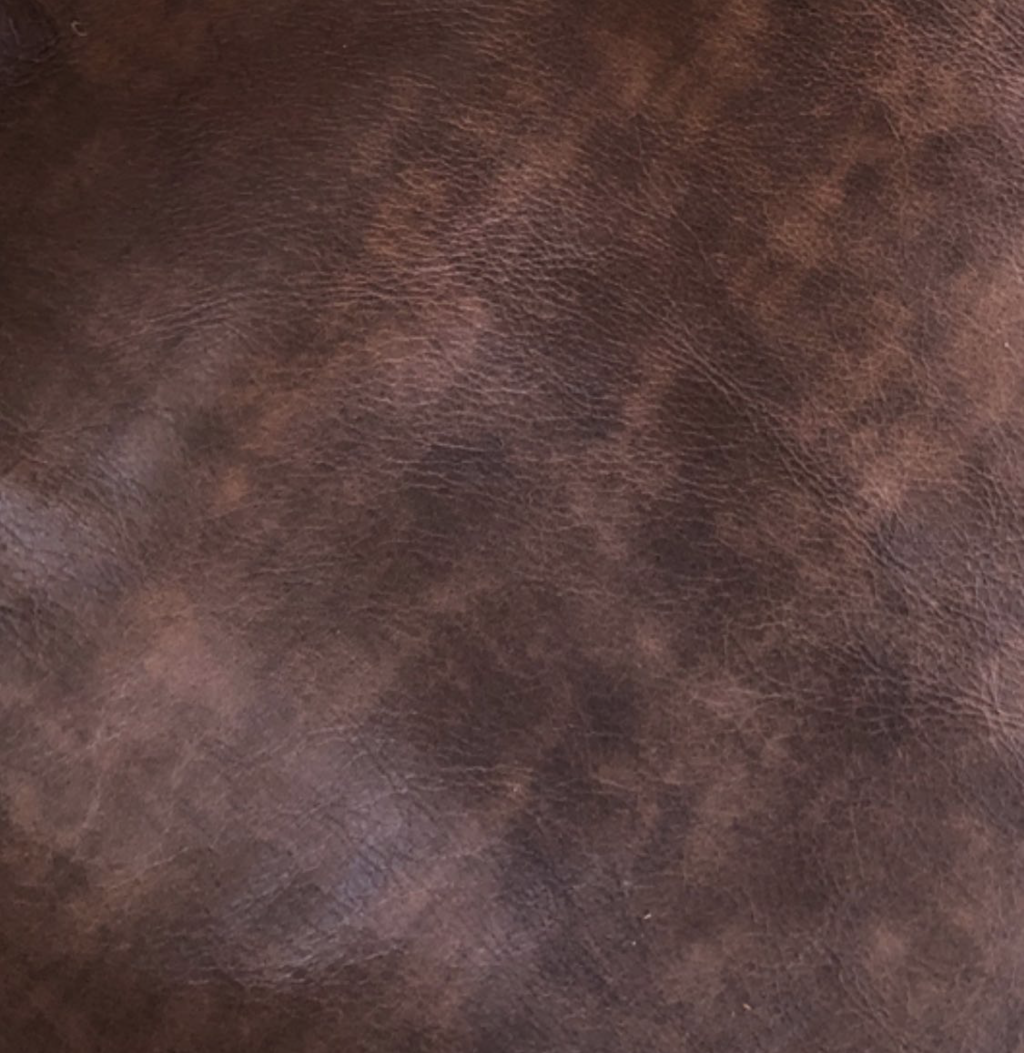 Коричневая с потертостями кожа