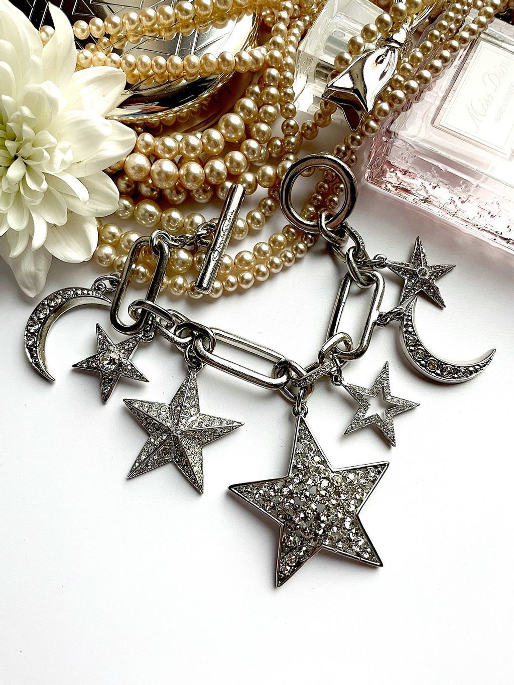 Браслет со звёздами и полумесяцами в светлом металле