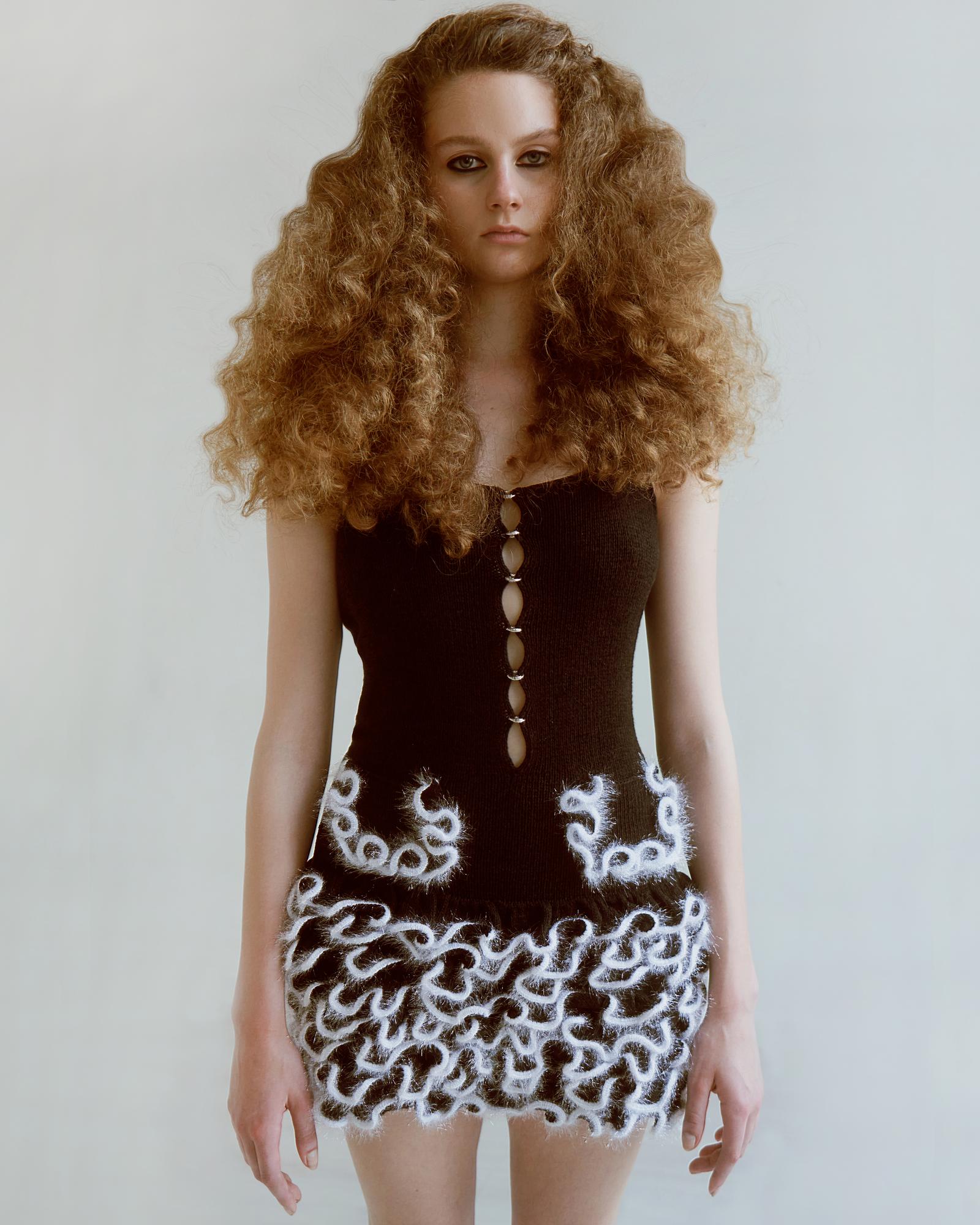 KNITTED DRESS WITH RINGS