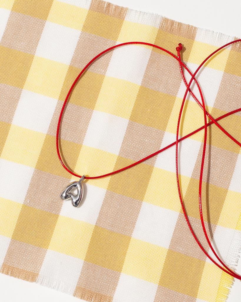 Шнурок с буквой