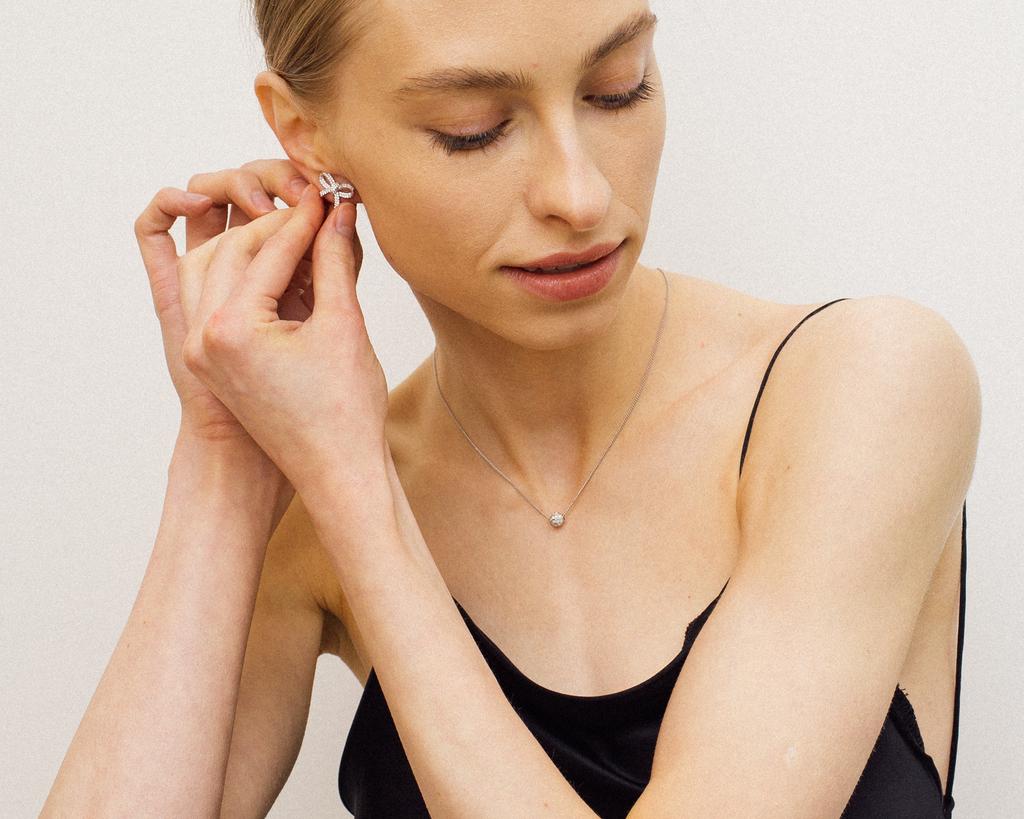 Серьги бантики с фианитами