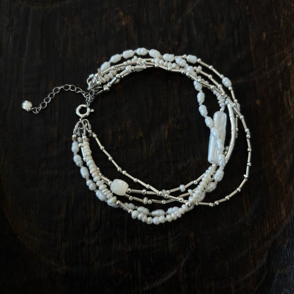 браслет из нитей жемчуга