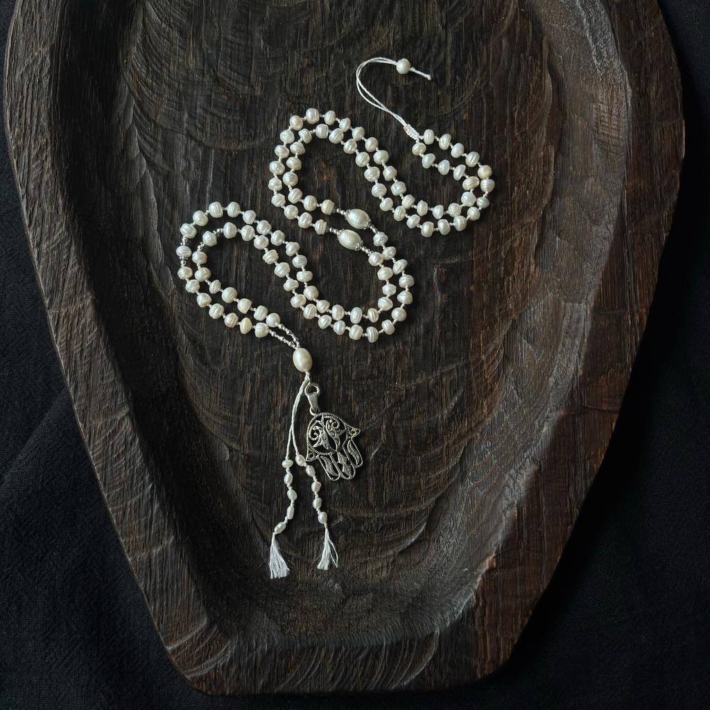 мала из натурального жемчуга с хамсой