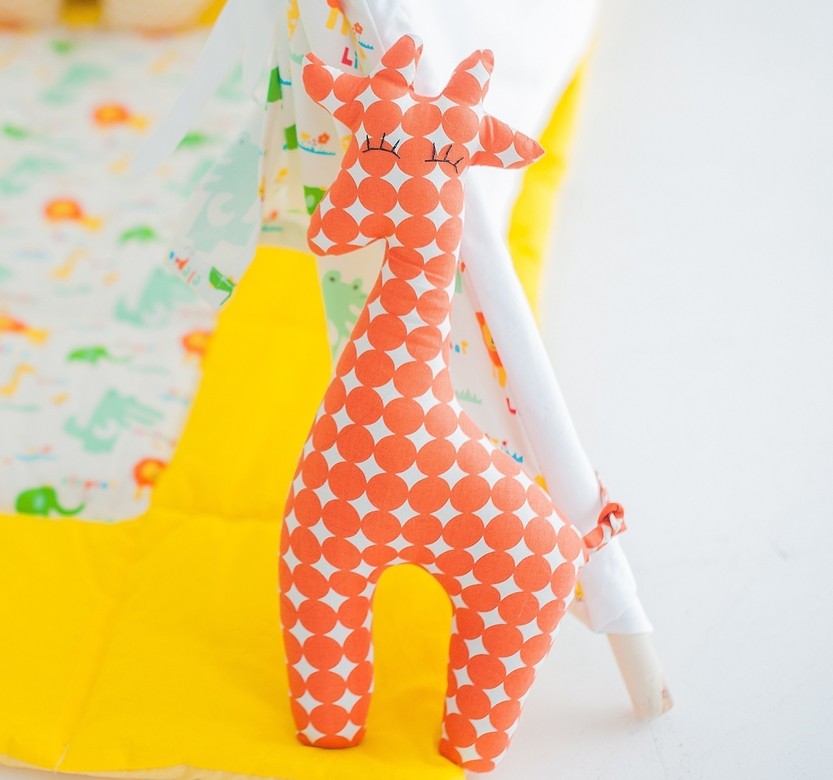 Игрушка "Жираф" в оранжевые круги