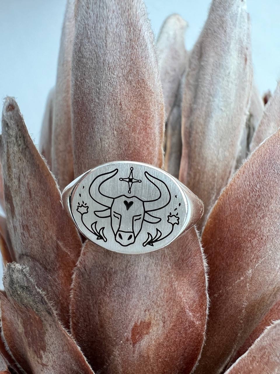 Тавр кольцо