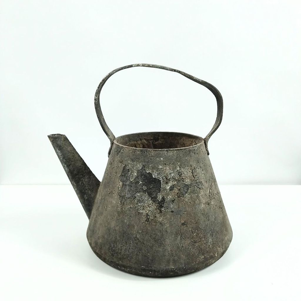 Металлический чайник