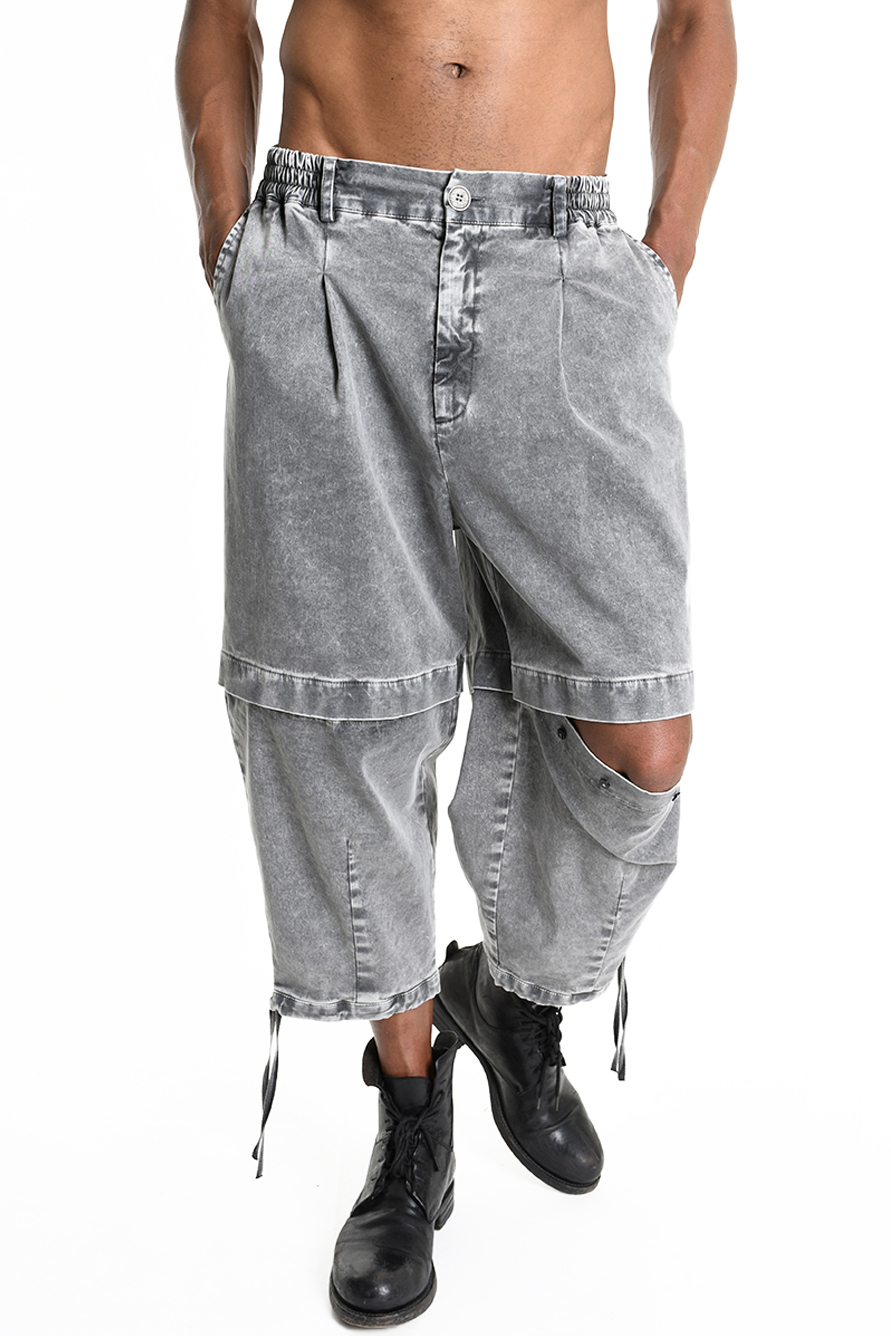 Брюки мраморного окраса с вырезами в области колен LH