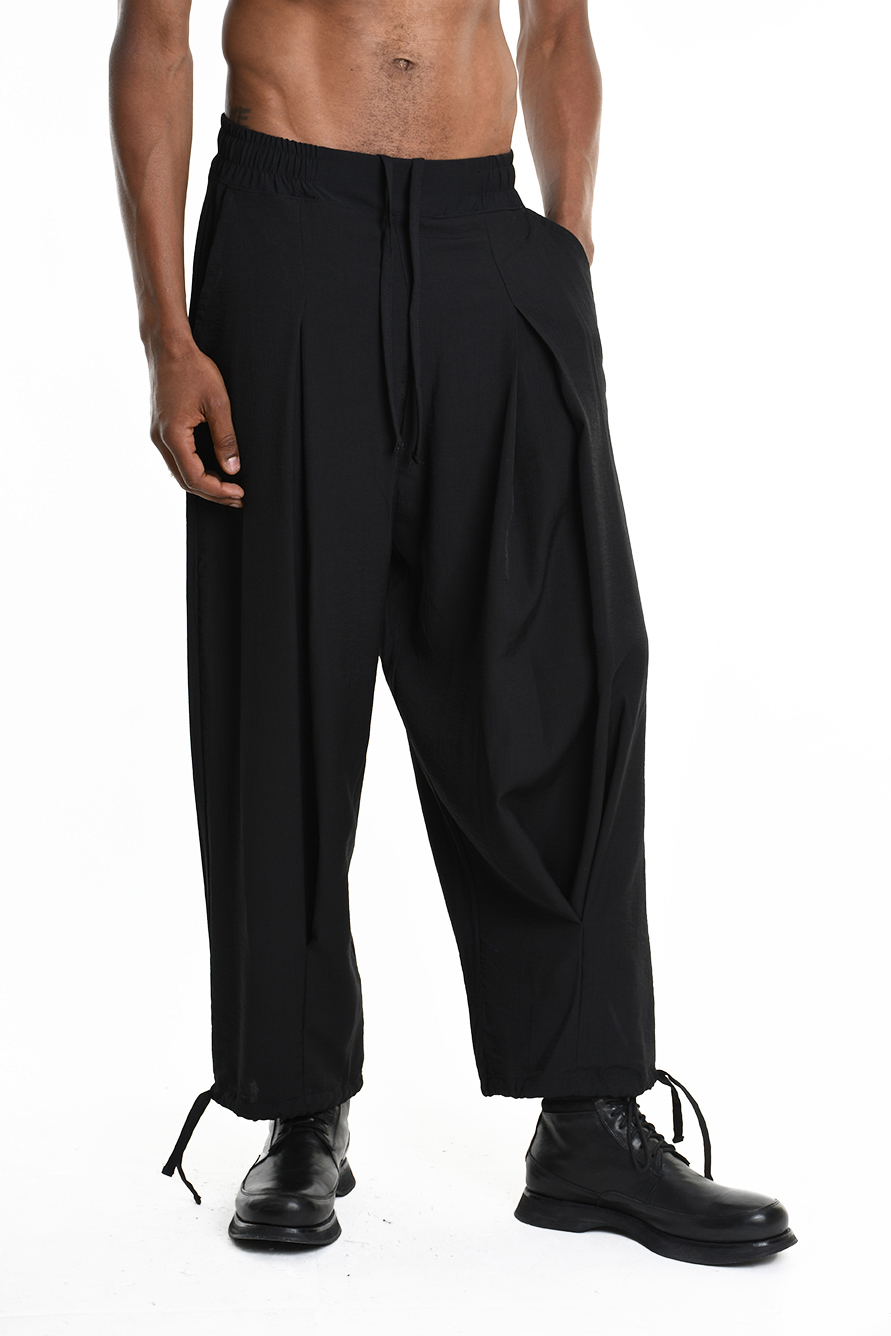 Широкие брюки из тисненой вискозы с защипами спереди LH